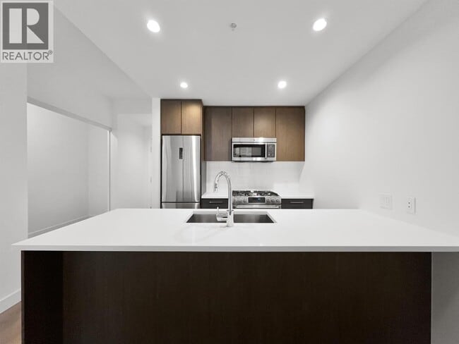 Building Photo - 9060 University Crescent