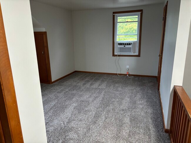 Upstairs bedroom (A/C window unit included) - 418 Maple Ave