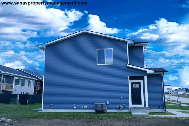 Building Photo - "Modern Elegance: A Must-See Two-Story Hom...
