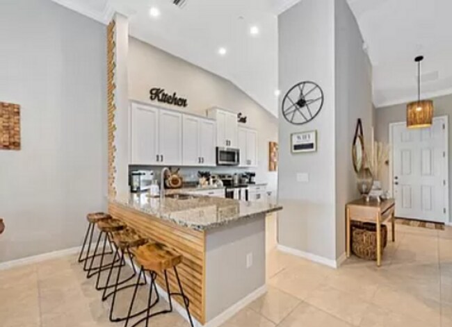 Foto del edificio - ** NEW CONSTRUCTION VERY MODERN 2 PLUS A DEN 2ND FLOOR CONDO WITH GOLF!!! ESPLANADE GOLF & COUNTR...