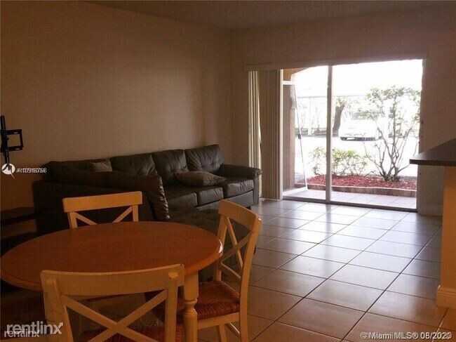 Building Photo - 2 br, 2 bath Condo - 9045 Pines Blvd