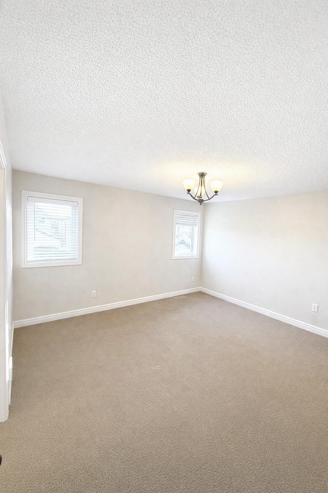 Building Photo - 16035-16011 11 Ave SW