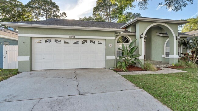 Building Photo - Your Perfect Haven Awaits: Spacious 4-Bedr...