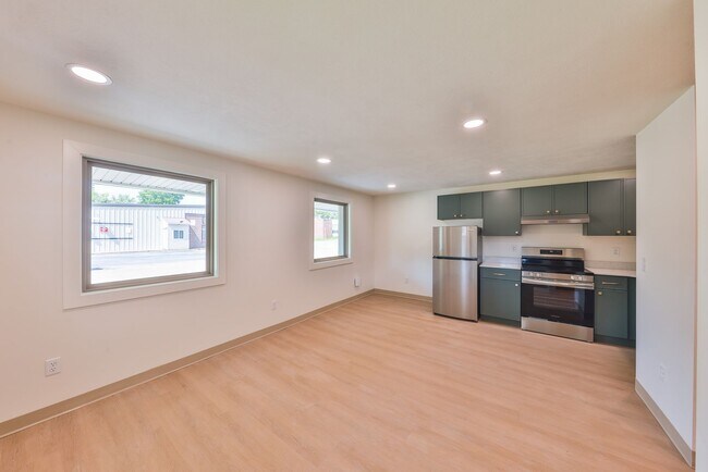 Building Photo - Modern Remodel with Designer Finishes | All Utilities Included