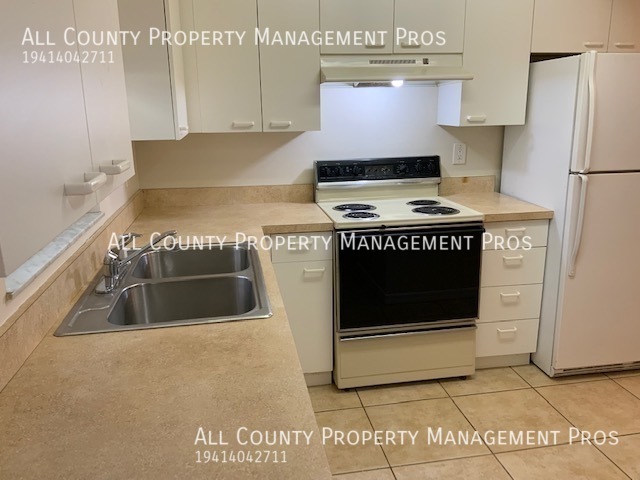 Building Photo - Great Location/Spacious/Near Airport/Pet F...