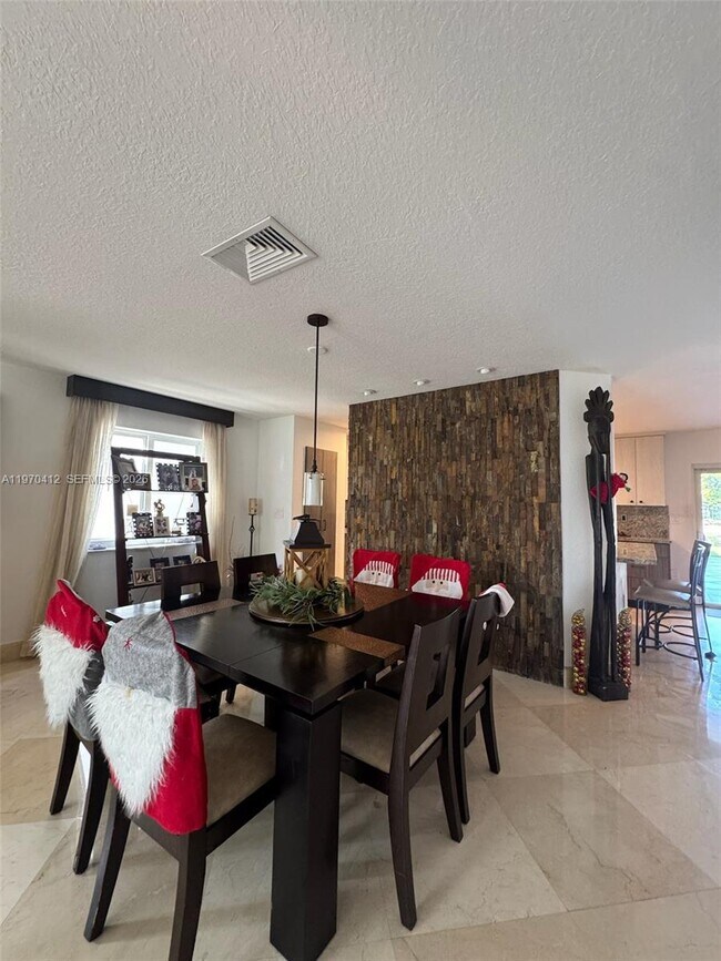 Foto del edificio - 10973 NW 53rd Ln