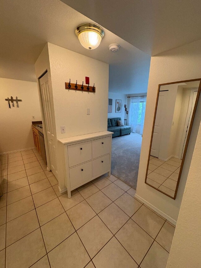 Building Photo - Bright, Modern 1BR Near Hospitals, SU & Transit in secure building with garage parking and a Walk...