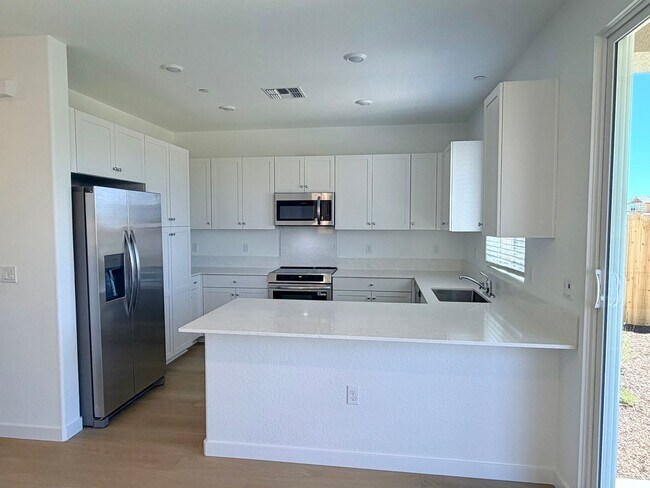 Building Photo - **Welcome to this beautifully designed 4-bedroom, 3-bathroom home offering modern living space.**