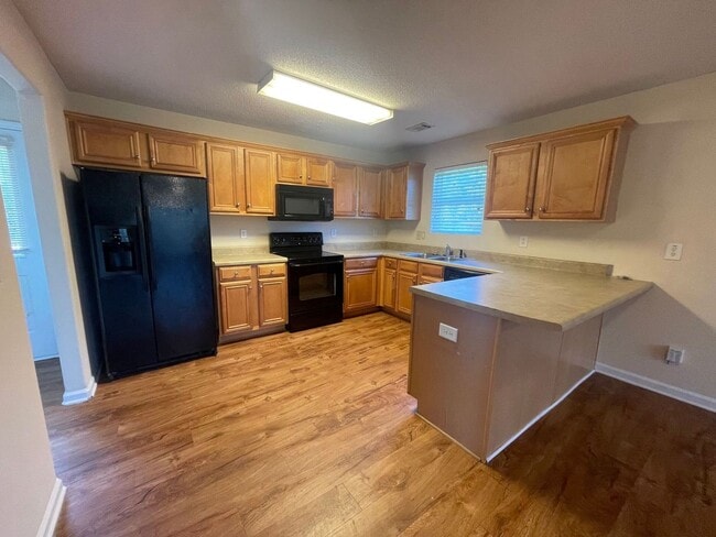 Building Photo - PRE-LEASING FOR AUGUST 2026 WITH 50% OFF D...