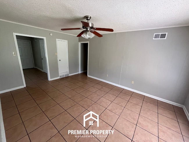 Building Photo - Charming 3BR/2BA in 38118 | Low-Maintenance Tile Floors, Bay Window & Patio