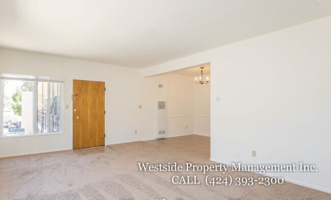 Building Photo - 145 N La Peer Dr