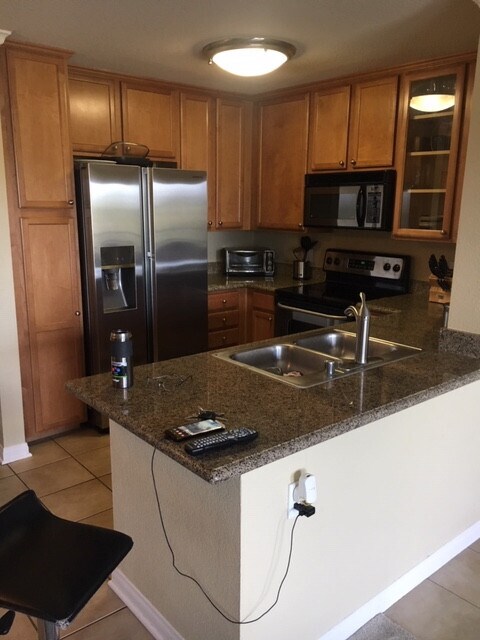 Building Photo - One bedroom condo in Triana complex of Cor...