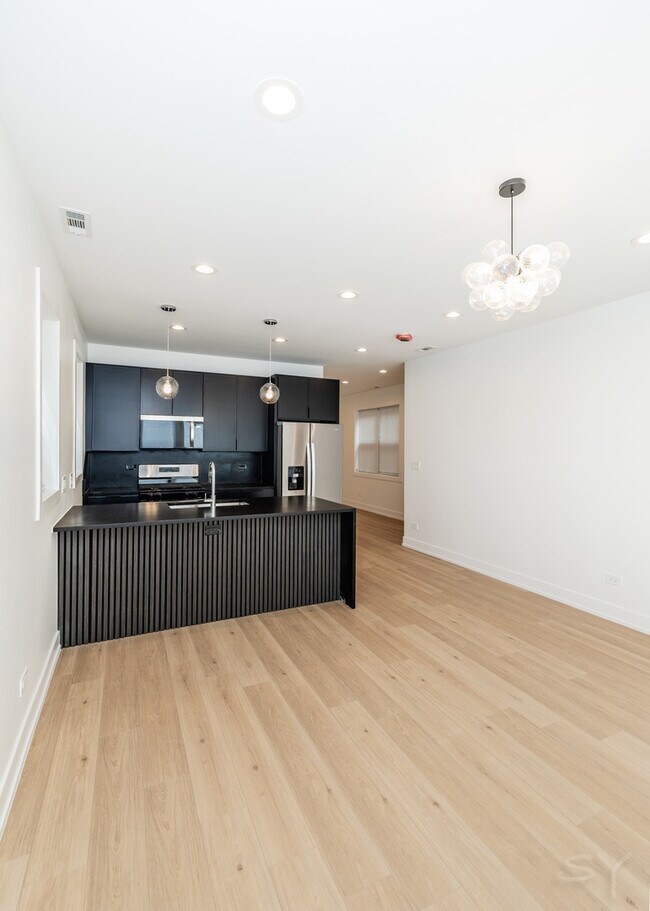 Foto del edificio - 6050 S Eberhart Ave