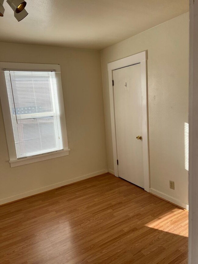 Building Photo - Fenced Yard - Laminate Flooring - Mid-Town - Extra Outside Storage