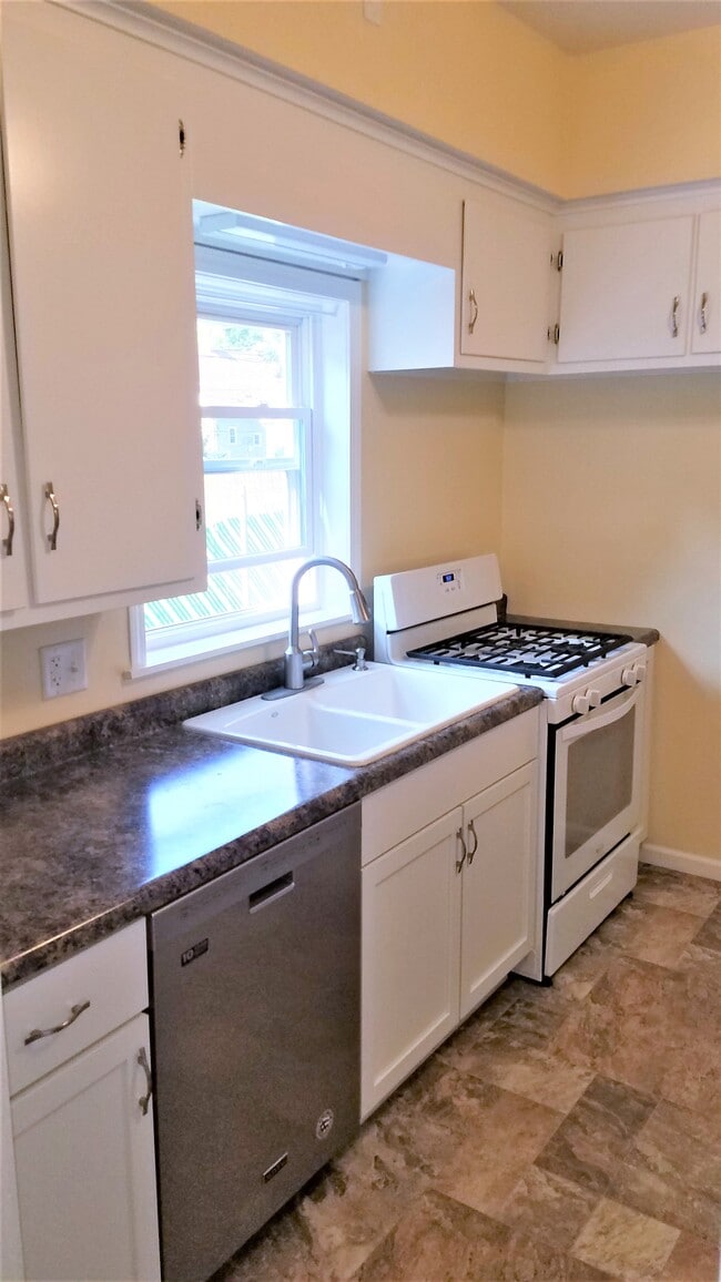 Kitchen remodeled in 2019. - 2104 Folger Ct
