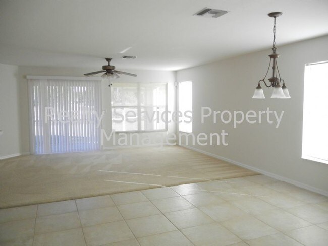 Building Photo - 3 CAR GARAGE...4 BEDROOM , GATED  COMMUNITY