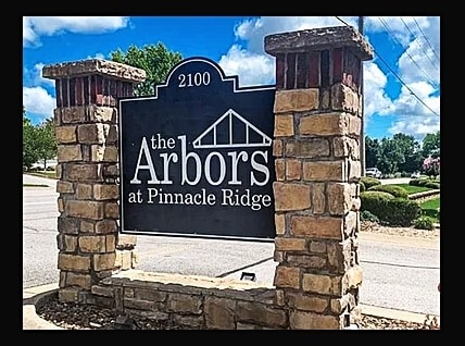 Entrance into the community - 2100 W New Hope Rd