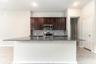 Building Photo - 20223 Rainflower Bay Ln