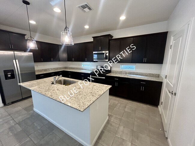 Building Photo - 6973 W Jadewood Ln