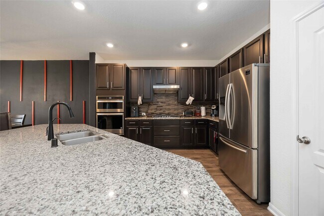 Foto del edificio - 8006 Ash Ridge Dr
