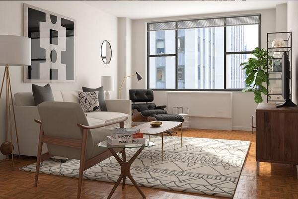 Natural light & hardwood throughout - 210 W 56th St