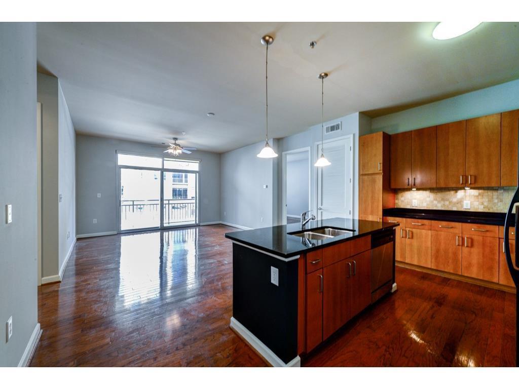 Kitchen and Living Room - 711 Cosmopolitan Dr NE