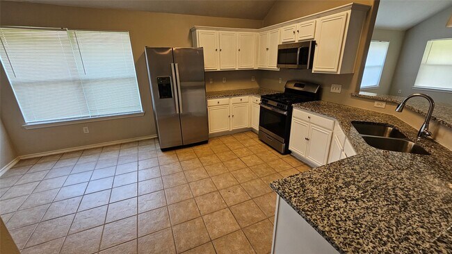 Foto del edificio - 9035 Melody Park Ln