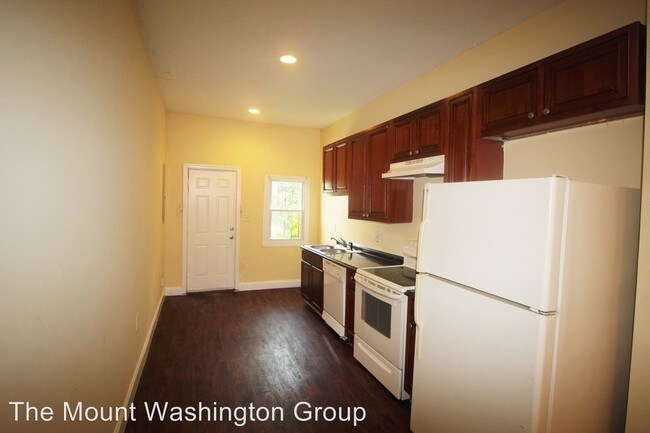 Building Photo - 305 S Stricker St