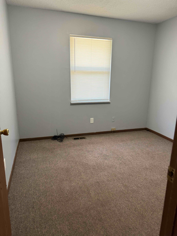 Building Photo - 8701 N Raintree Ct