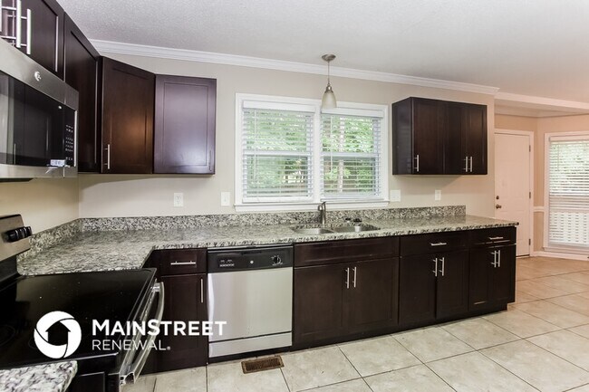 Building Photo - 6806 Van De Rohe Dr