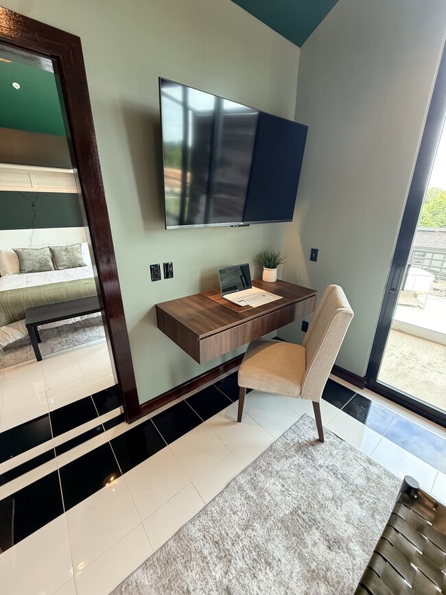 Extended Stay Executive Suite Desk-Eating Area - Villas on Turtle Creek