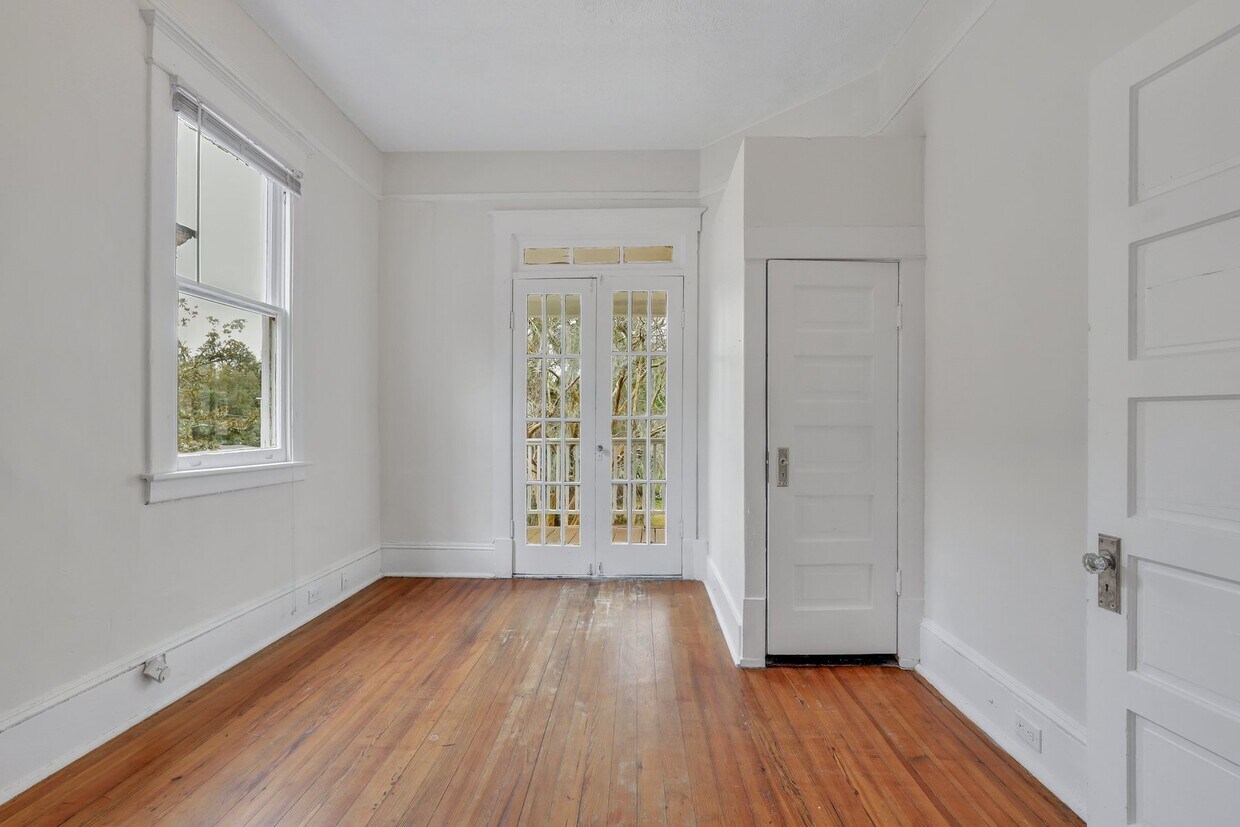 Front Bedroom with French Doors leading out onto deck/porch - 1120 E 31st St
