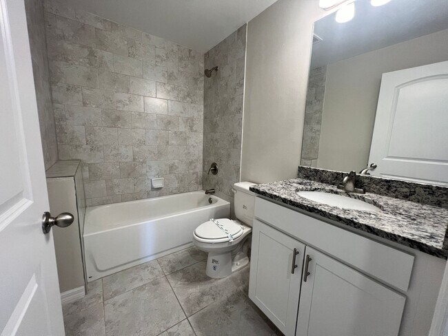 Building Photo - $500 off SPECIAL * Cape Coral 3BR/2BA Home with 2-Car Garage and Screened Lanai