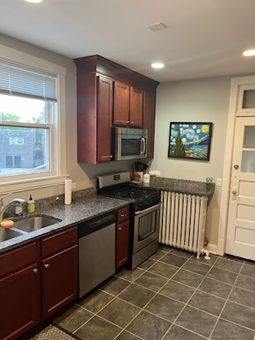 Building Photo - 5634 N Miltimore Ave