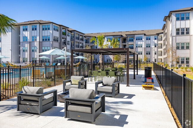 Área de fogata y salón - Solaris at Kissimmee