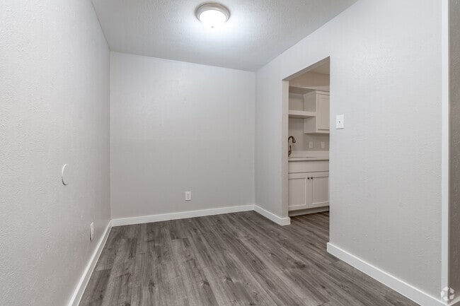 Cypress - 2BR, 1BA - 805SF - Dining Room - Gazebo Apartments (Denton, Tx)