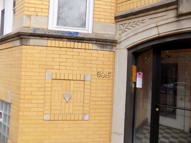 . - 8015-8017 S Ellis Ave