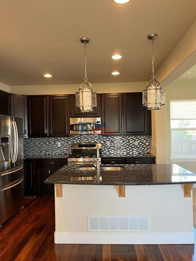 Foto principal - 10417 Rutledge St