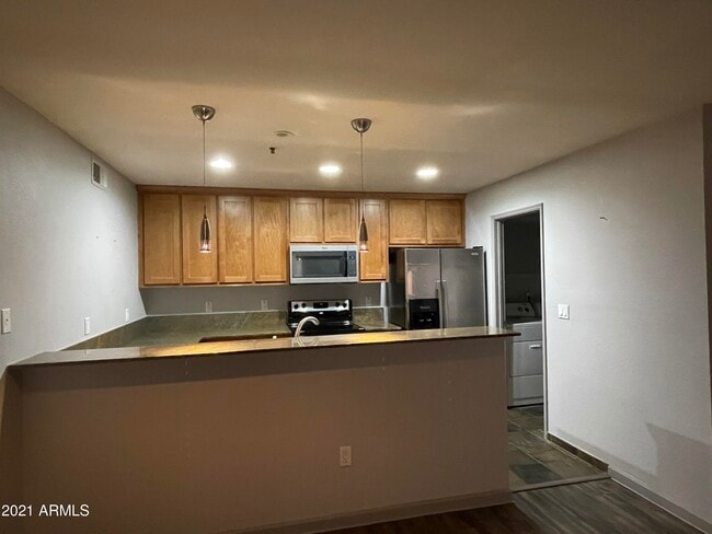 Building Photo - 4704 E Paradise Village Pkwy N