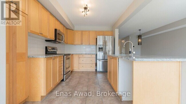Building Photo - 122 Talltree Crescent