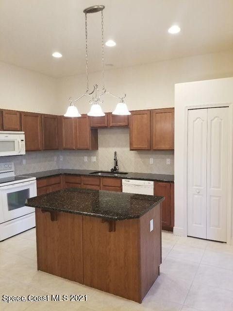 Kitchen with Island - 1050 Eleuthera Dr NE