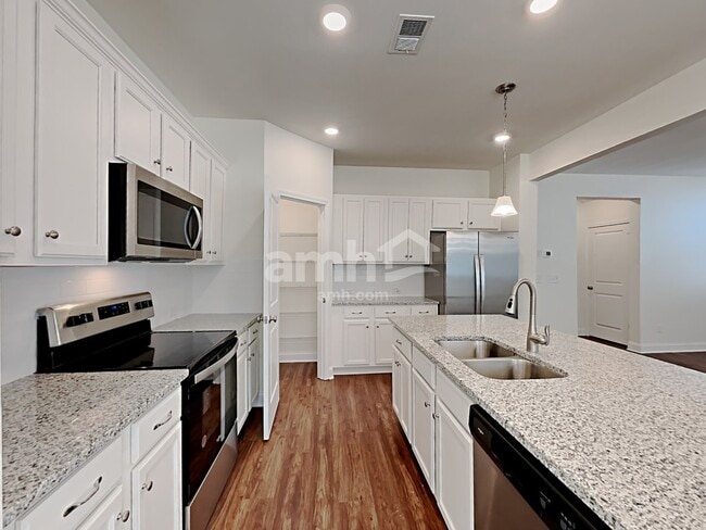Building Photo - 7057 Creeksong Dr