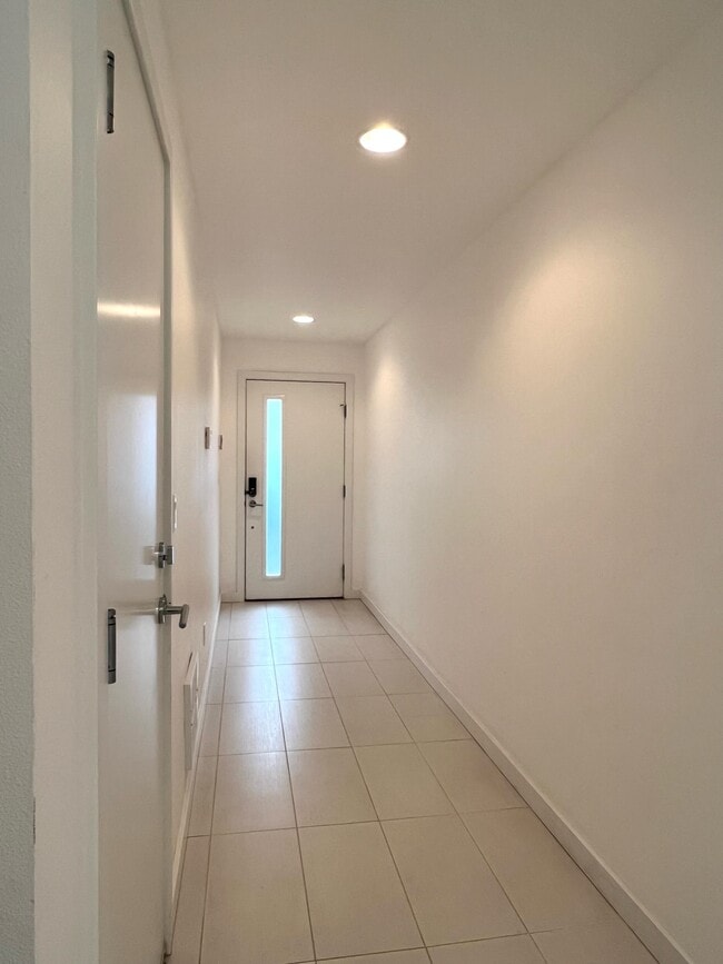 First floor hallway. - 211 13th Ave E