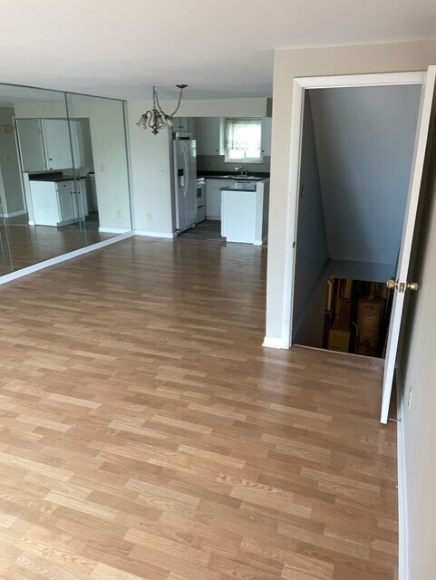 Living Room, stairs to basement - 4066 Oneida St