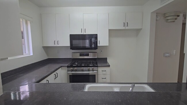 Cocina - Champagnat Apartments Towers