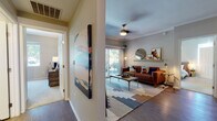 This single-story residence at 365 W Burgundy St in Highlands Ranch, Colorado, offers a thoughtfully designed layout that balances comfort and functionality. The entryway greets visitors with wood-style flooring and neutral-toned walls, setting a clean, modern tone carried throughout the home.

The living room serves as a central gathering space, featuring crown molding, a ceiling fan, and large sliding glass doors that open to a private balcony overlooking lush greenery—filling the room with natural light and outdoor views. The kitchen is well-equipped with stainless steel appliances, including a range, microwave, and dishwasher, complemented by wood-toned cabinetry, a subway tile backsplash, and white countertops.

The bedrooms offer carpeted flooring, generous natural light from well-positioned windows, and walk-in closet storage. The bathrooms are finished with wood-toned vanities, white countertops, and tub-shower combinations with clean tile surrounds. Wood-style flooring runs through the bathrooms, adding a cohesive design element. Overall, the residence presents a modern, comfortable living environment in a well-established Colorado community.