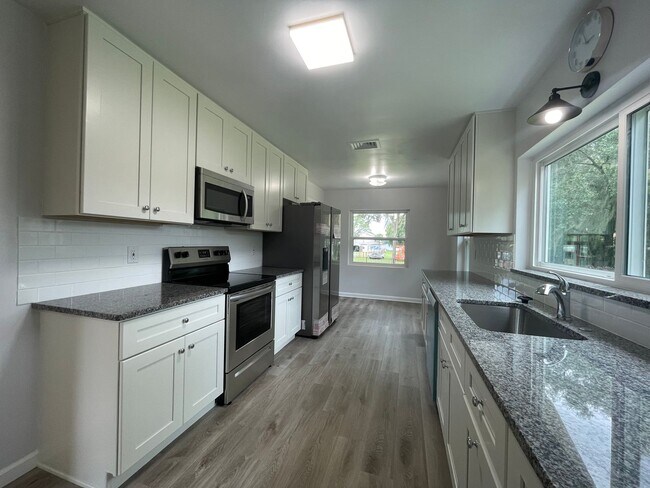 Building Photo - Upgraded 3 BR, 2 BA Single Family Home Ove...