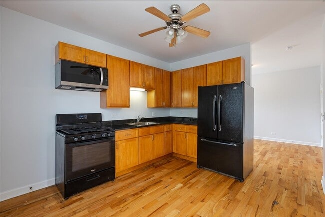 Foto del edificio - 1234 W 49th Pl