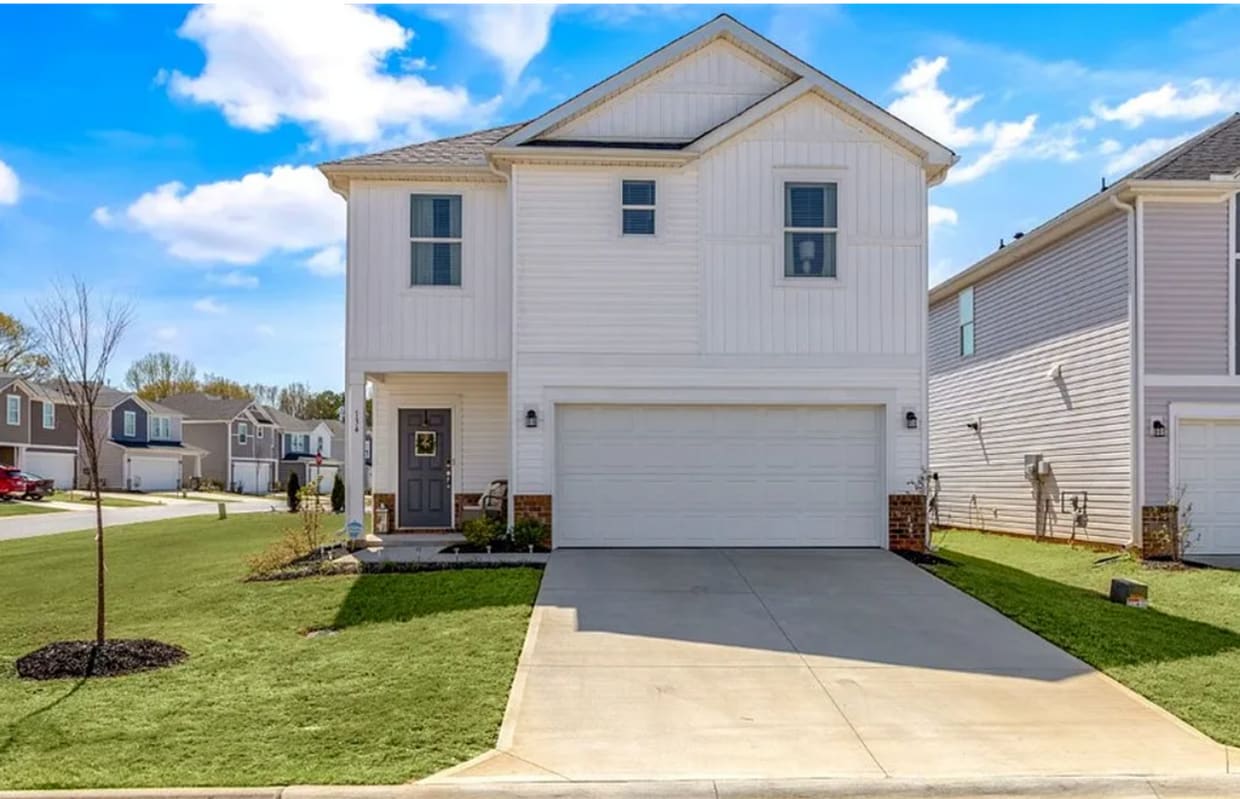 Primary Photo - Modern 3-Bedroom Home