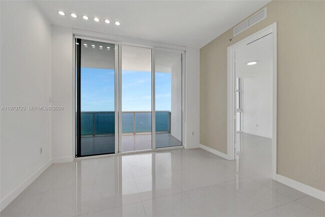 Building Photo - 18201 Collins Ave